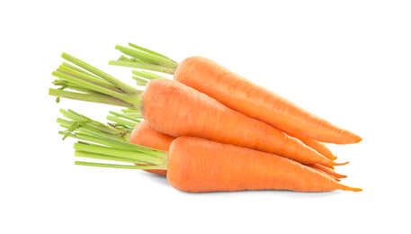Photo of Pile of fresh ripe carrots isolated on white