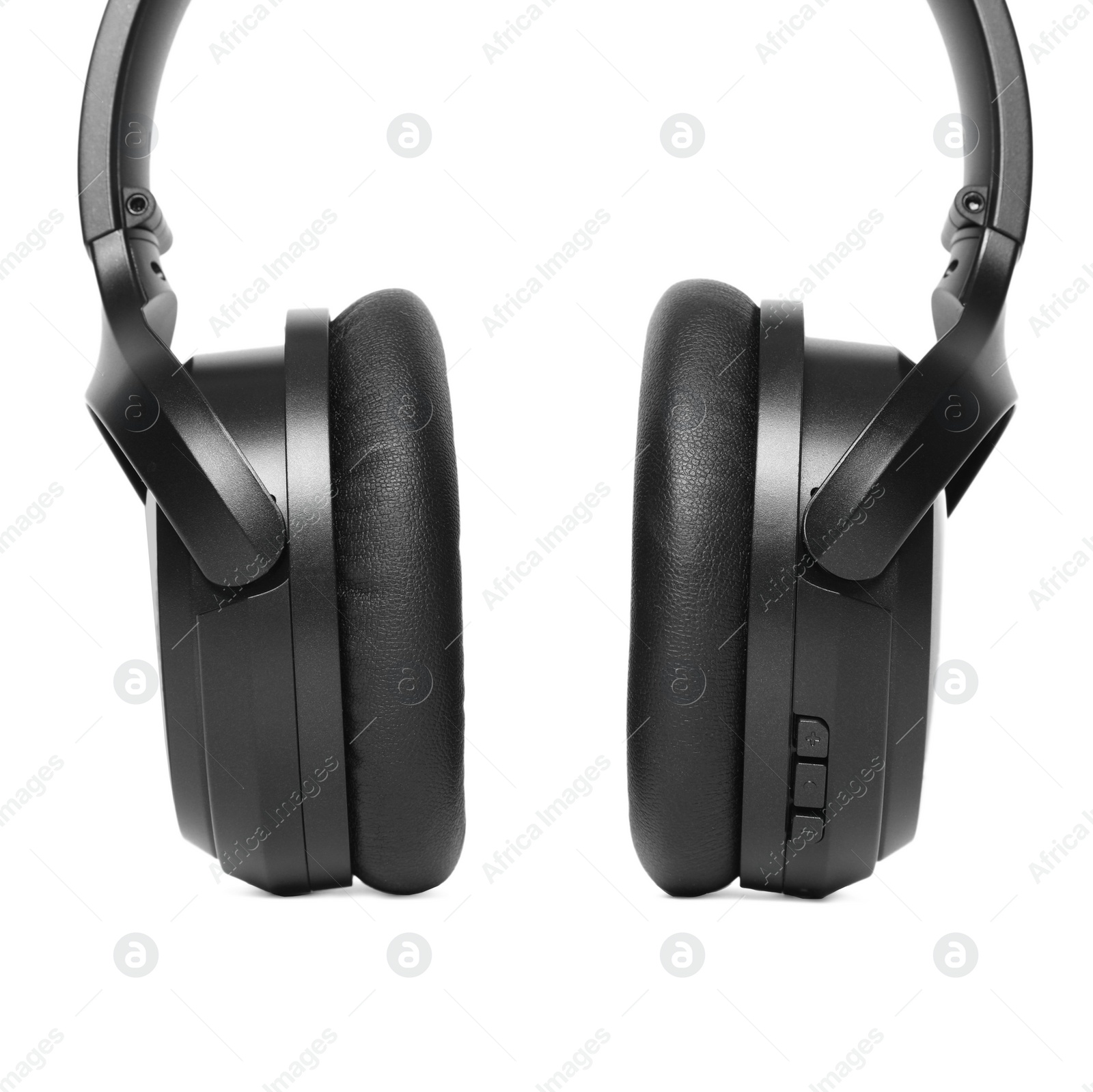 Photo of Modern black wireless headphones isolated on white