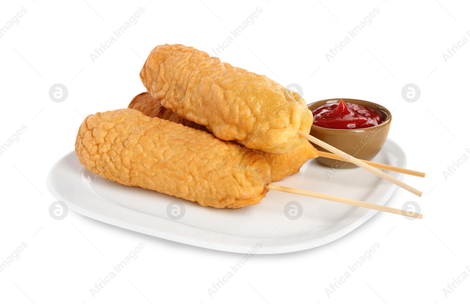 Photo of Delicious deep fried corn dogs with ketchup on white background