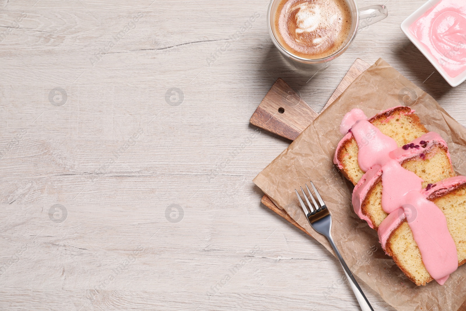 Photo of Cut tasty sweet cake and aromatic coffee on wooden table, flat lay. Space for text