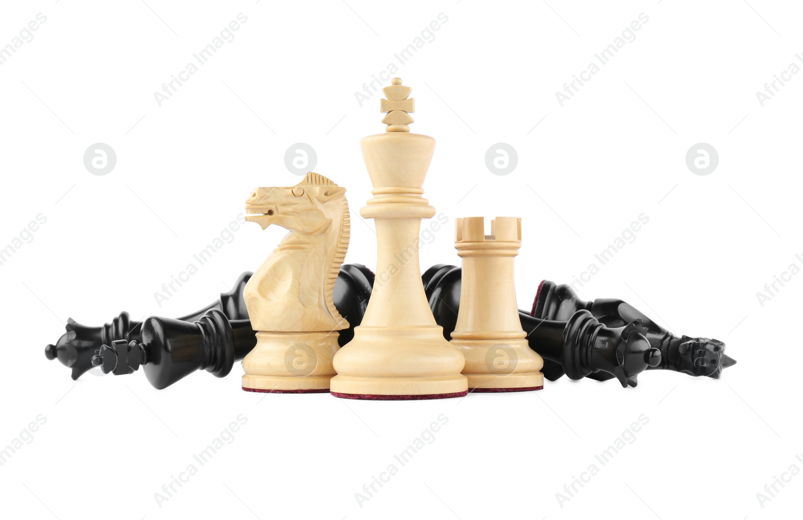 Photo of Many different chess pieces on white background