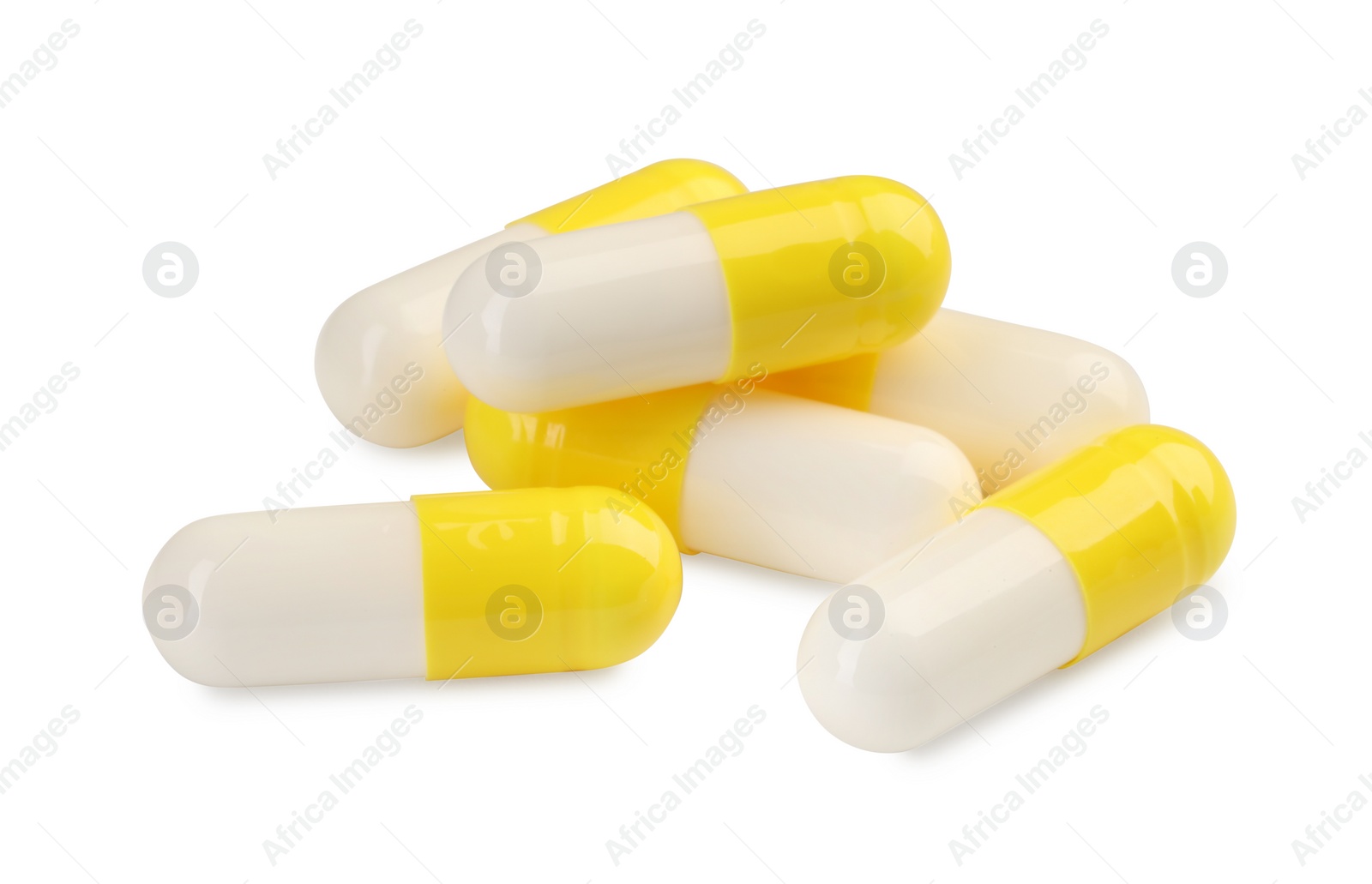 Photo of Many antibiotic pills isolated on white. Medicinal treatment