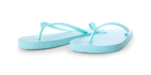 Light blue flip flops isolated on white. Beach accessory