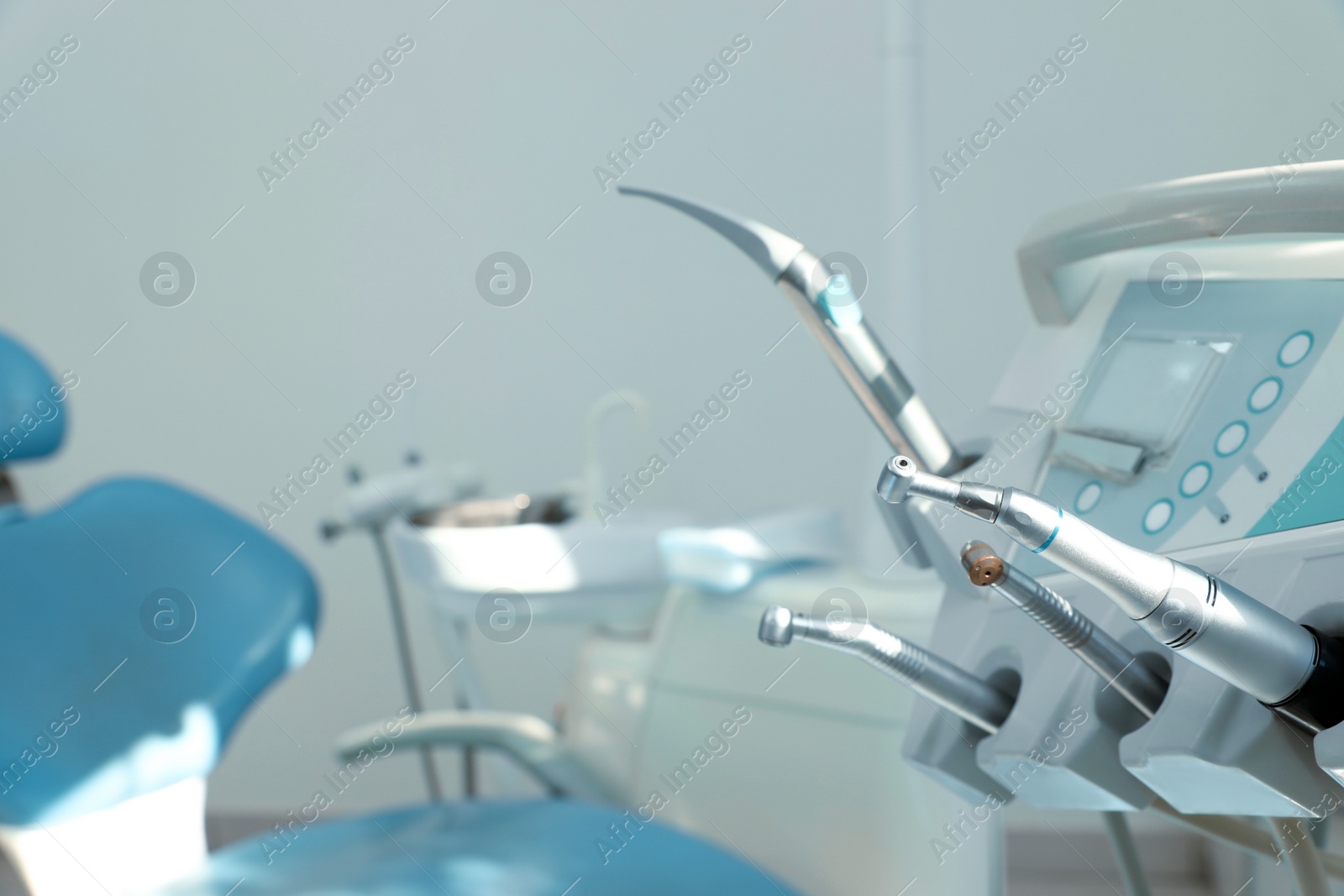 Photo of Set of professional equipment in dentist's office, space for text