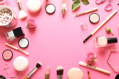 Photo of Flat lay composition with products for decorative makeup on pink background