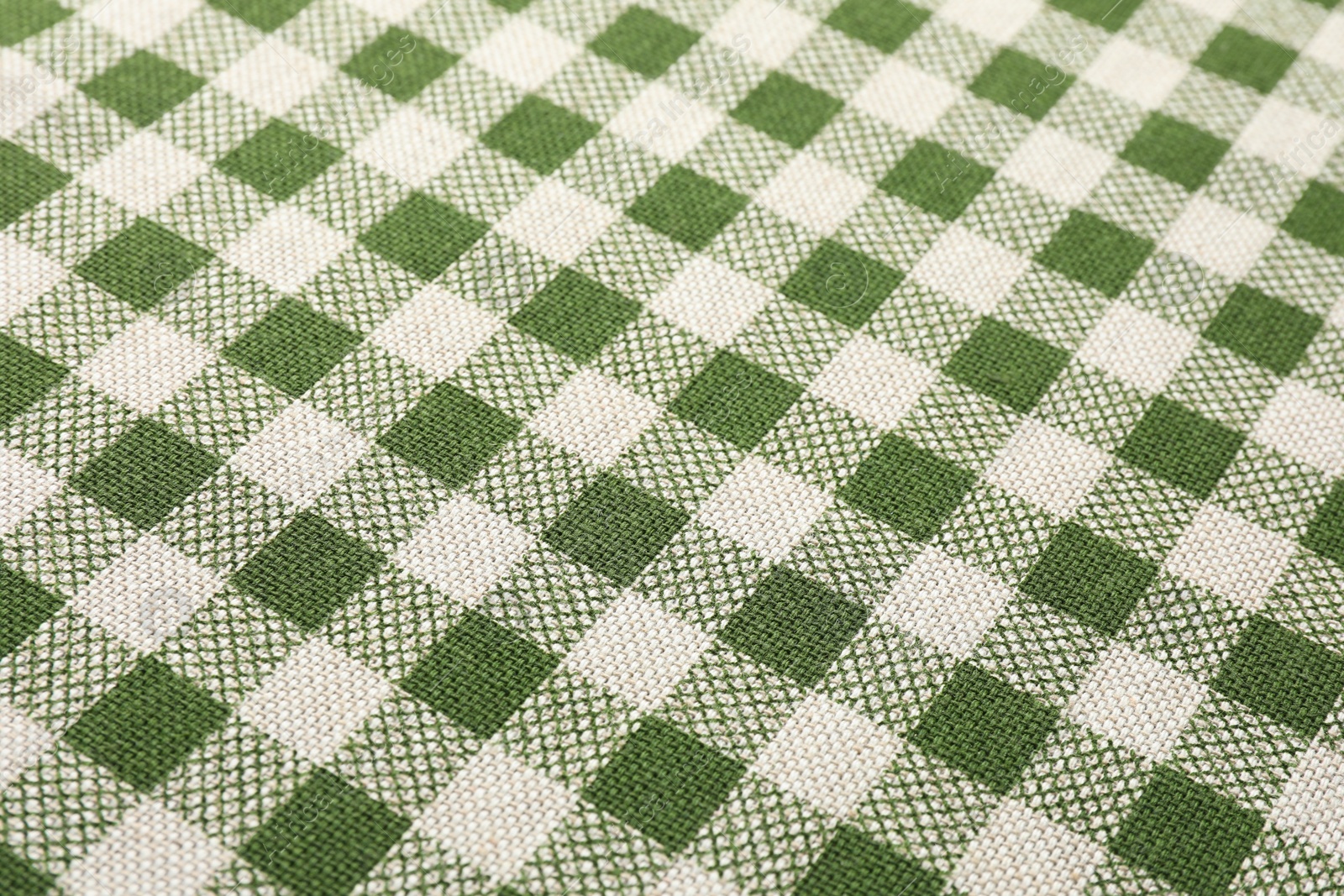 Photo of Texture of checkered fabric as background, closeup