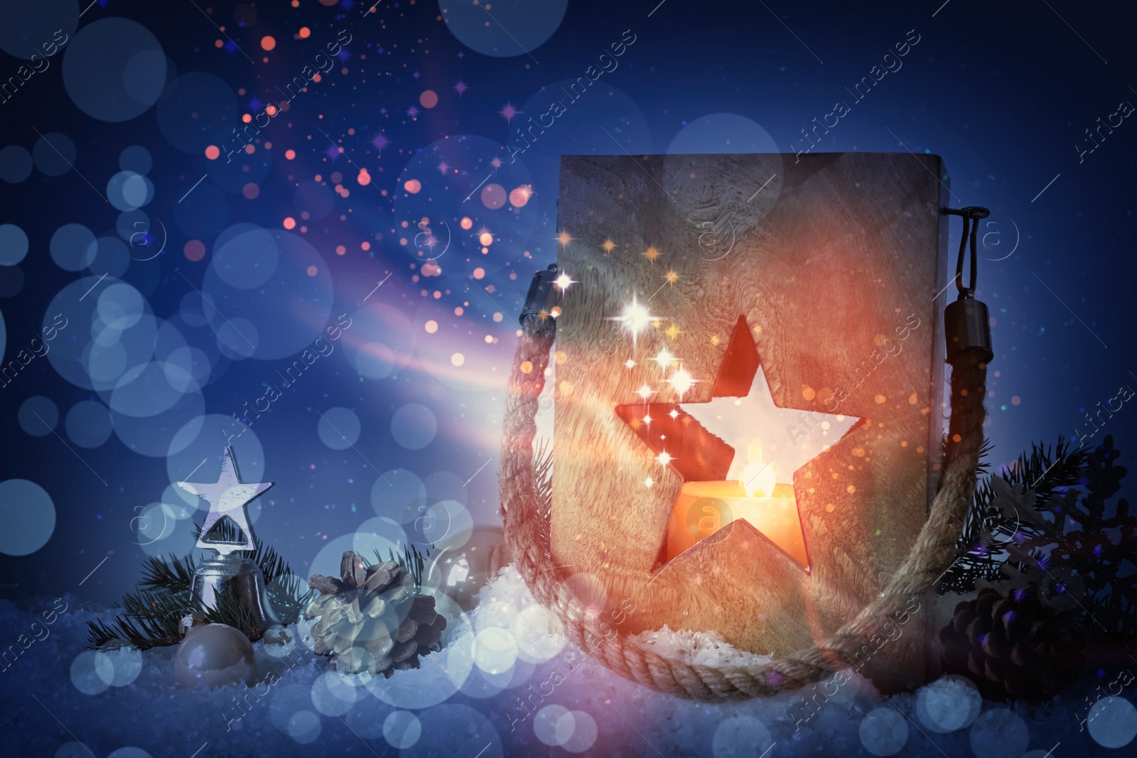 Image of Composition with wooden Christmas lantern on snow. Magical atmosphere 