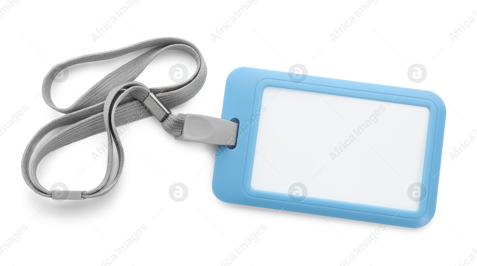 Photo of Blank light blue badge with string isolated on white, top view