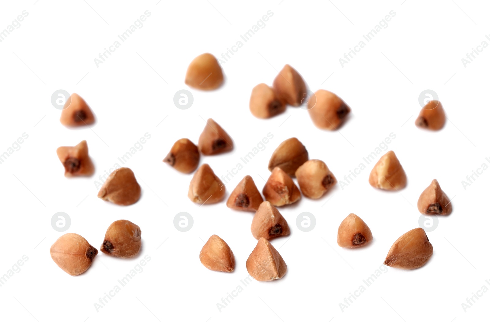 Photo of Buckwheat grains isolated on white. Organic cereal