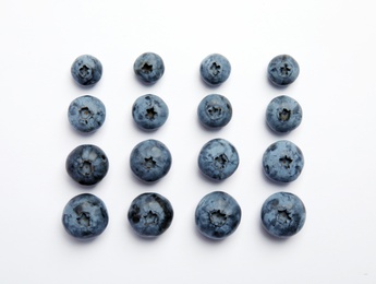 Photo of Flat lay composition with tasty blueberry on white background