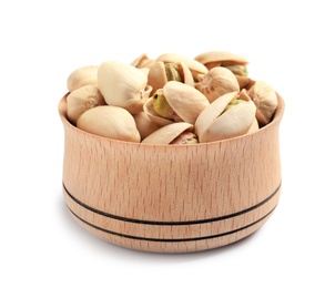 Photo of Organic pistachio nuts in wooden bowl isolated on white, closeup