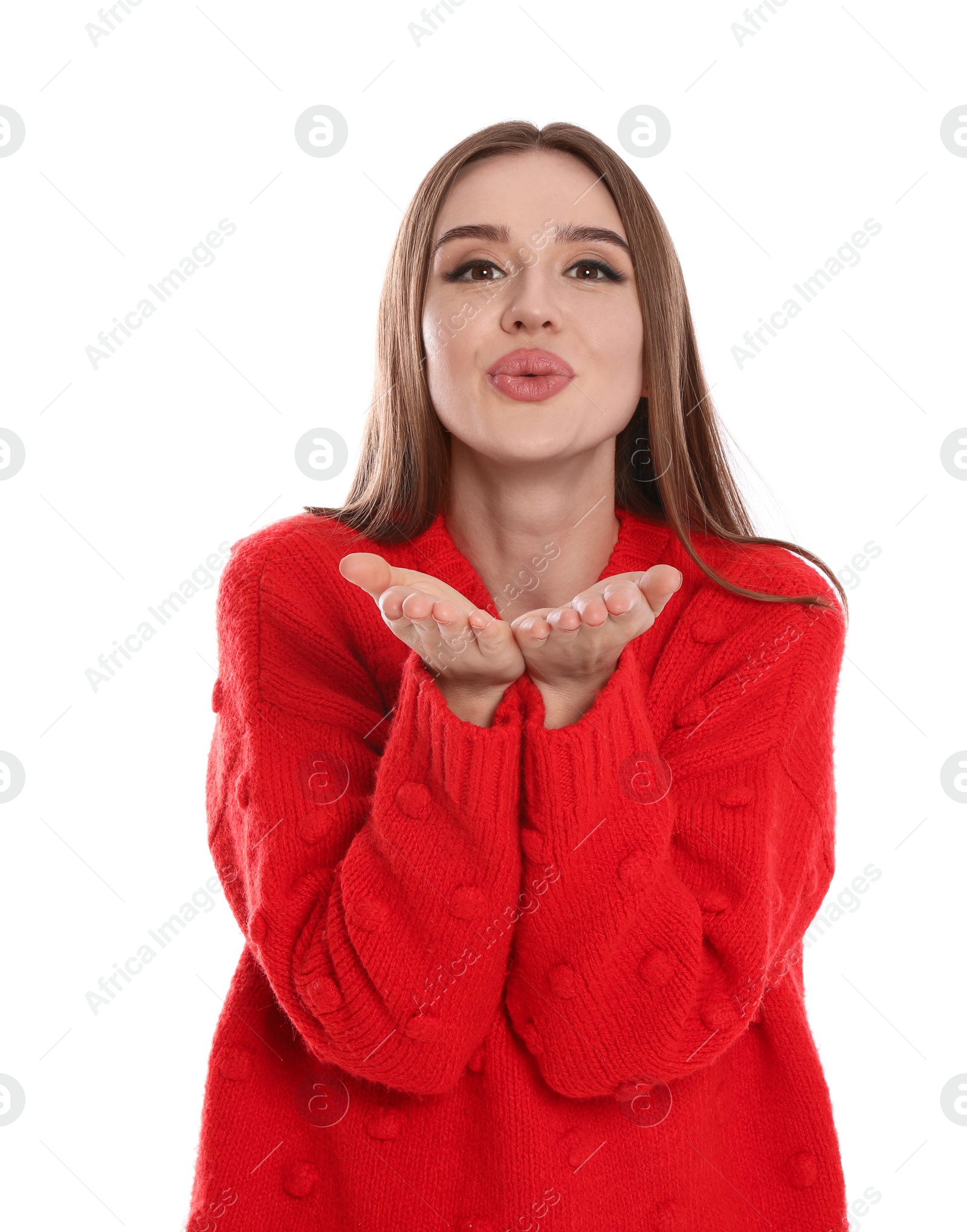 Photo of Beautiful young woman in red sweater on white background. Winter season