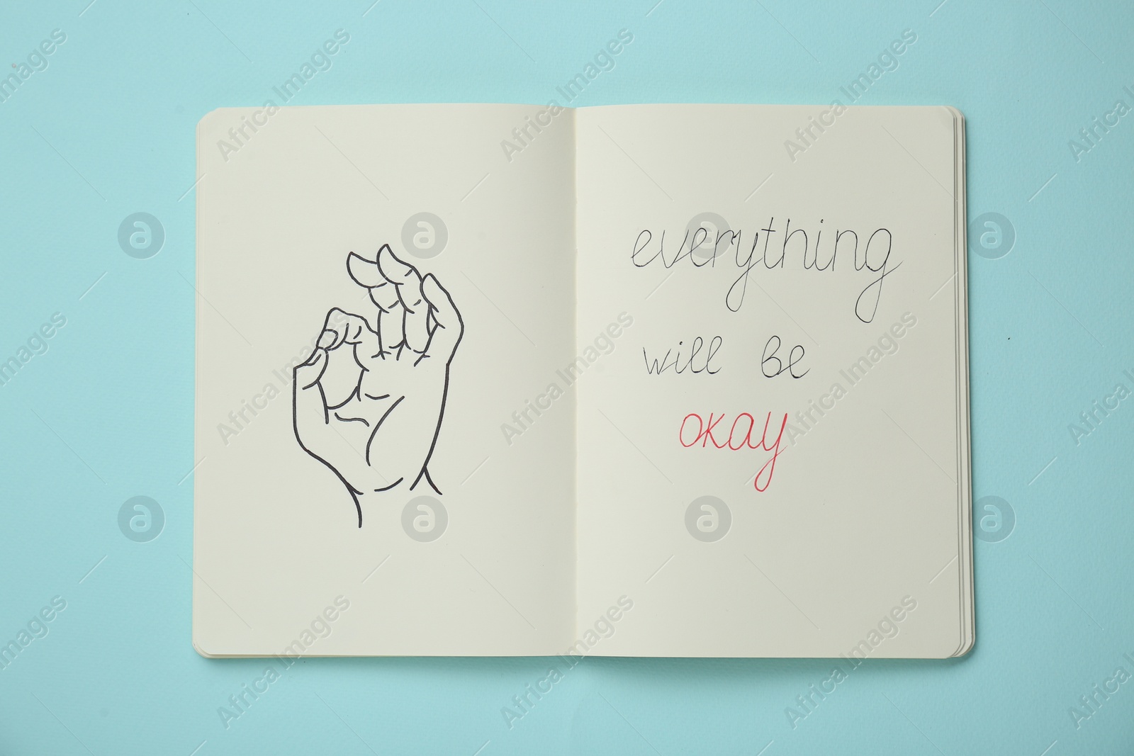 Photo of Notebook with phrase Everything Will Be Okay and drawing of hand showing gesture on light turquoise, top view