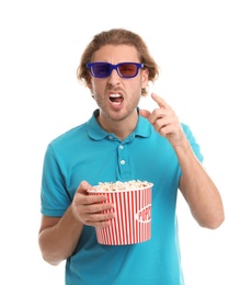 Photo of Emotional man with 3D glasses and popcorn during cinema show on white background