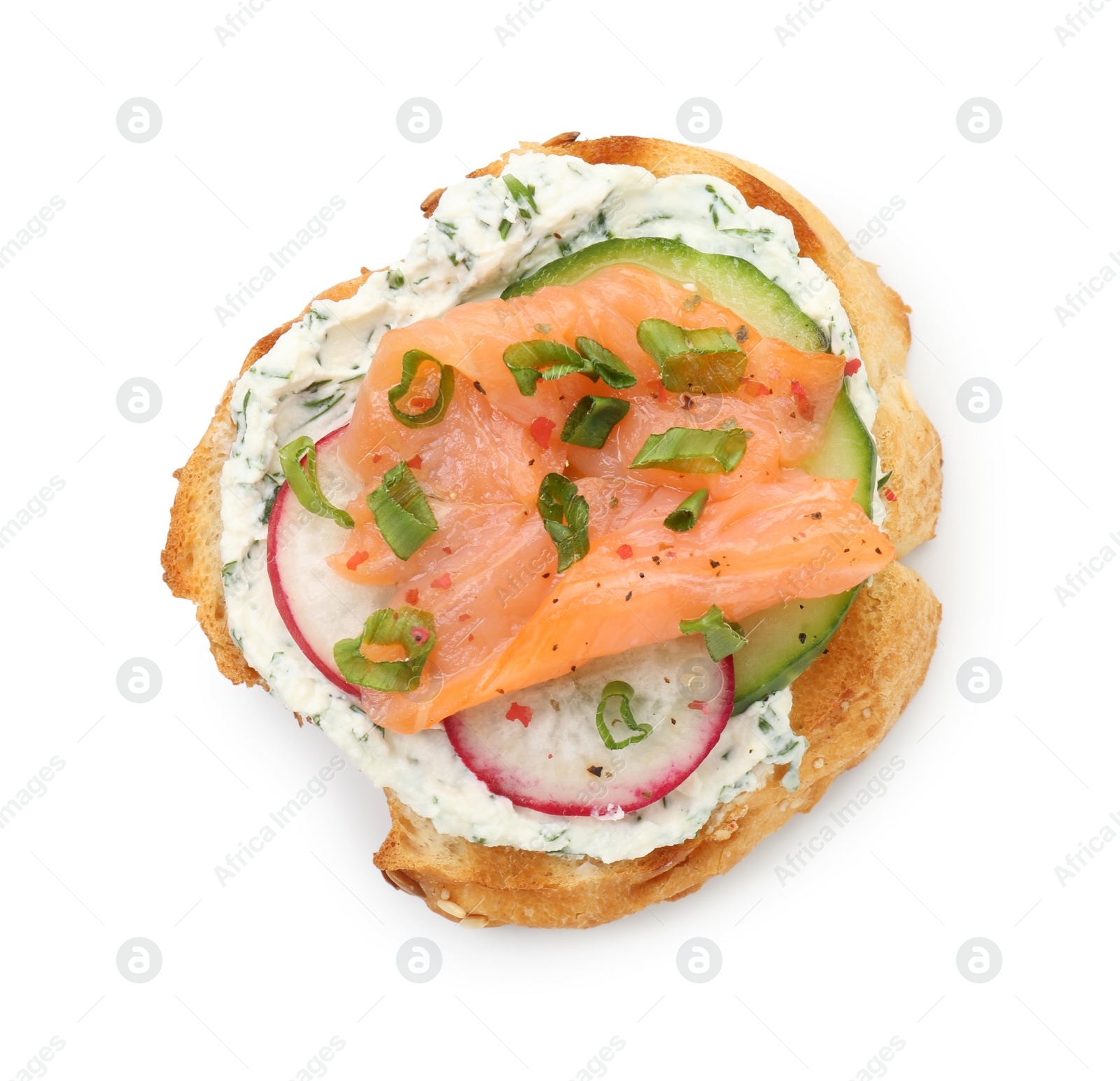 Photo of Tasty canape with salmon, cucumber, radish and cream cheese isolated on white, top view