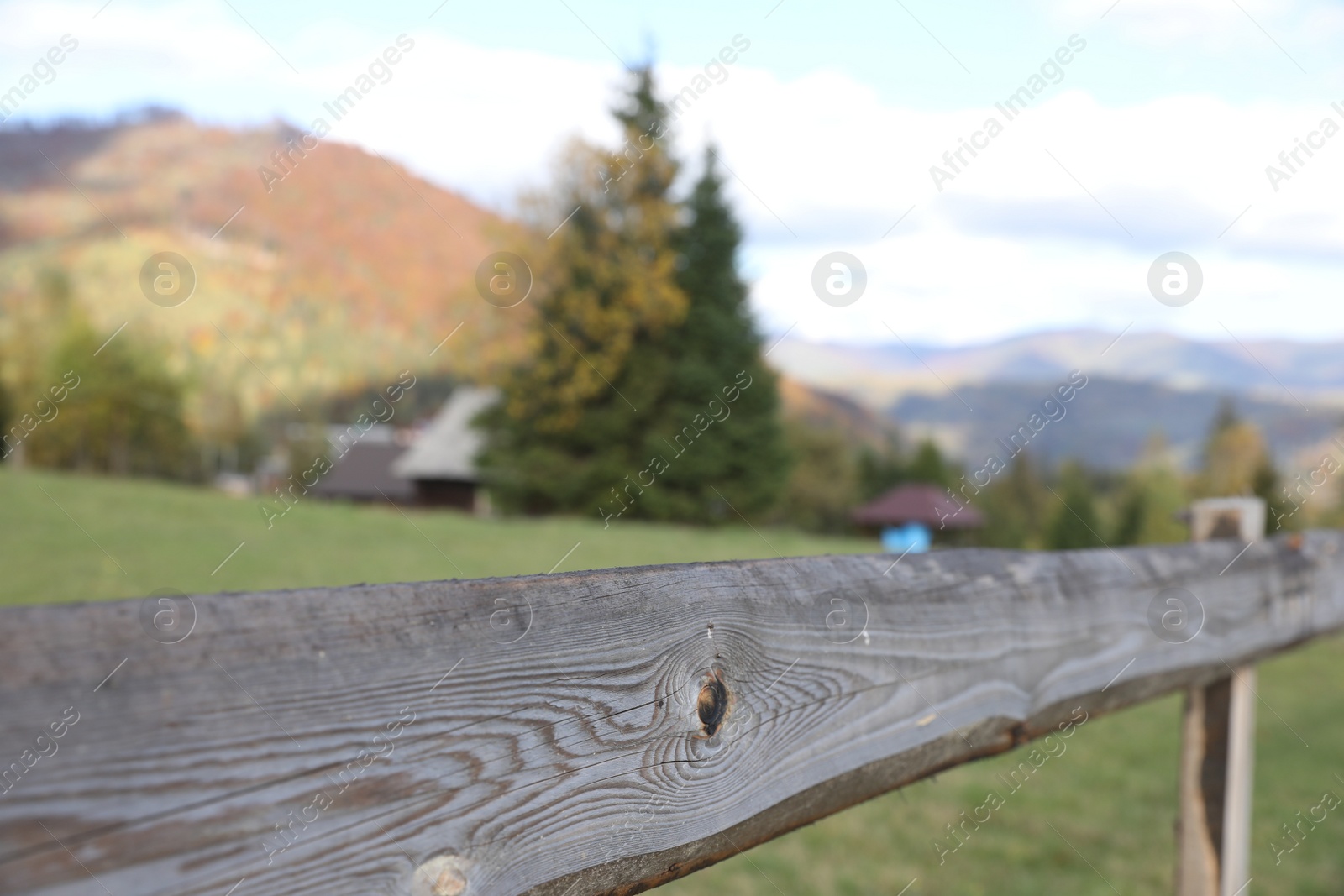 Photo of Closeup view of old wooden fence outdoors