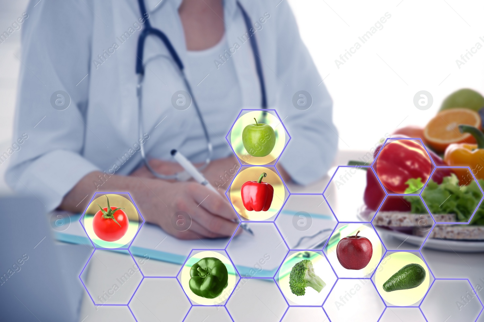 Image of Nutritionist working at desk in office and images of different products. Healthy eating