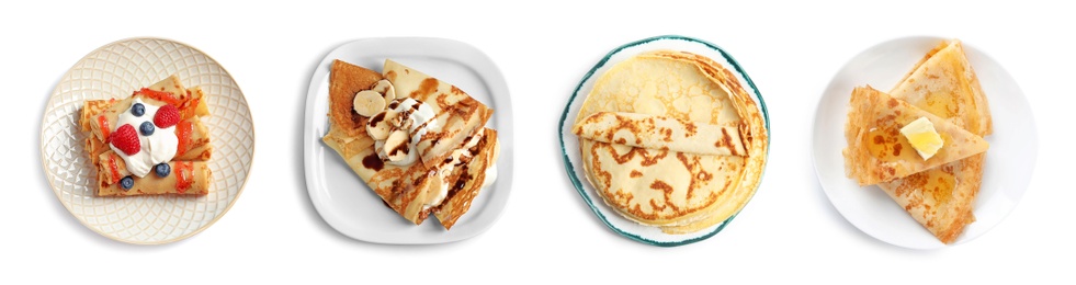 Image of Set of tasty thin pancakes on white background, top view. Banner design