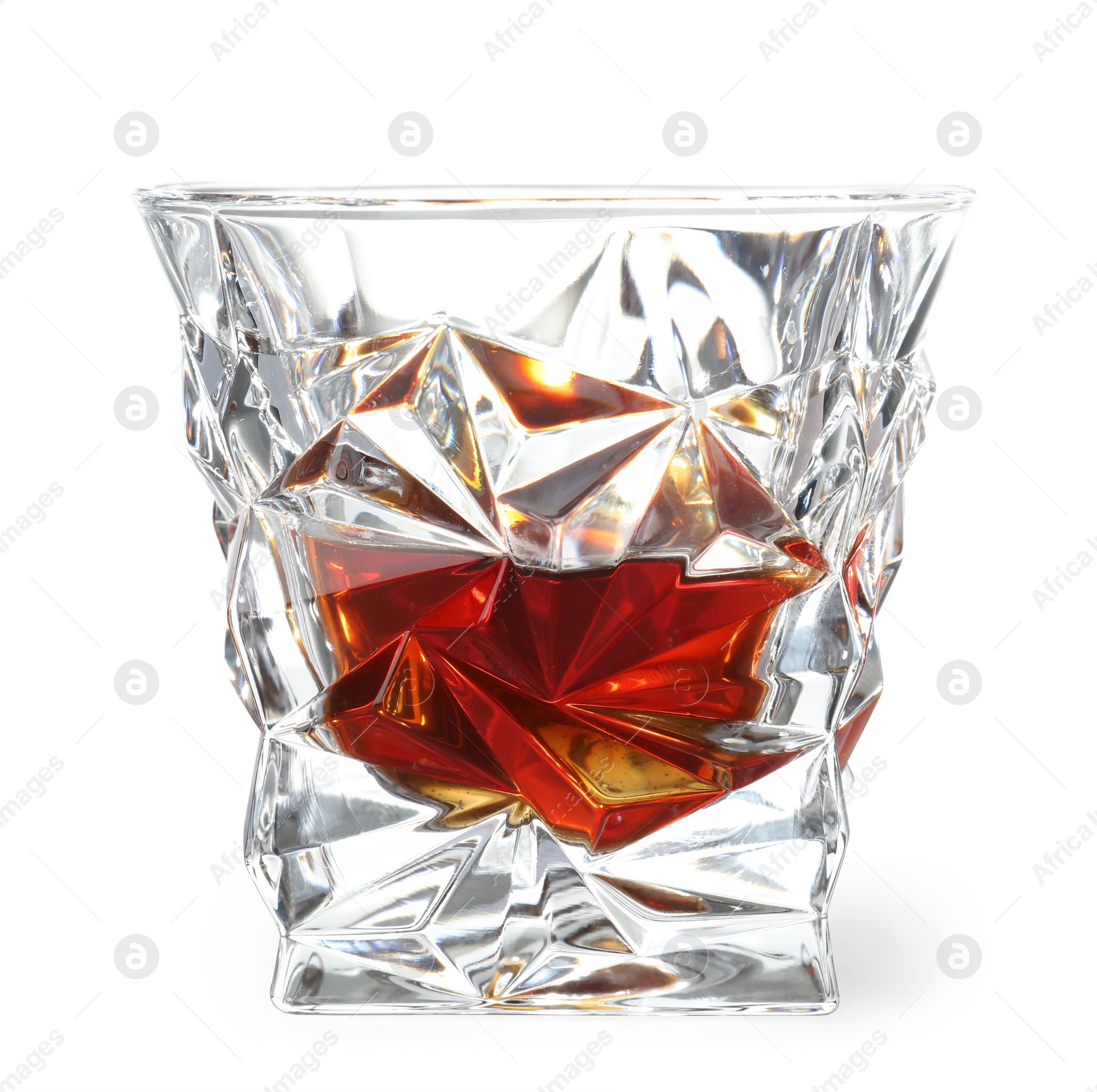 Photo of Glass of scotch whiskey on white background