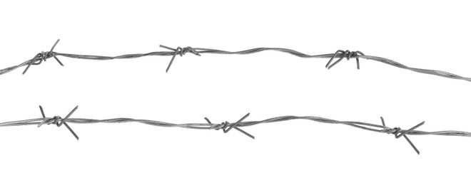 Shiny metal barbed wire isolated on white