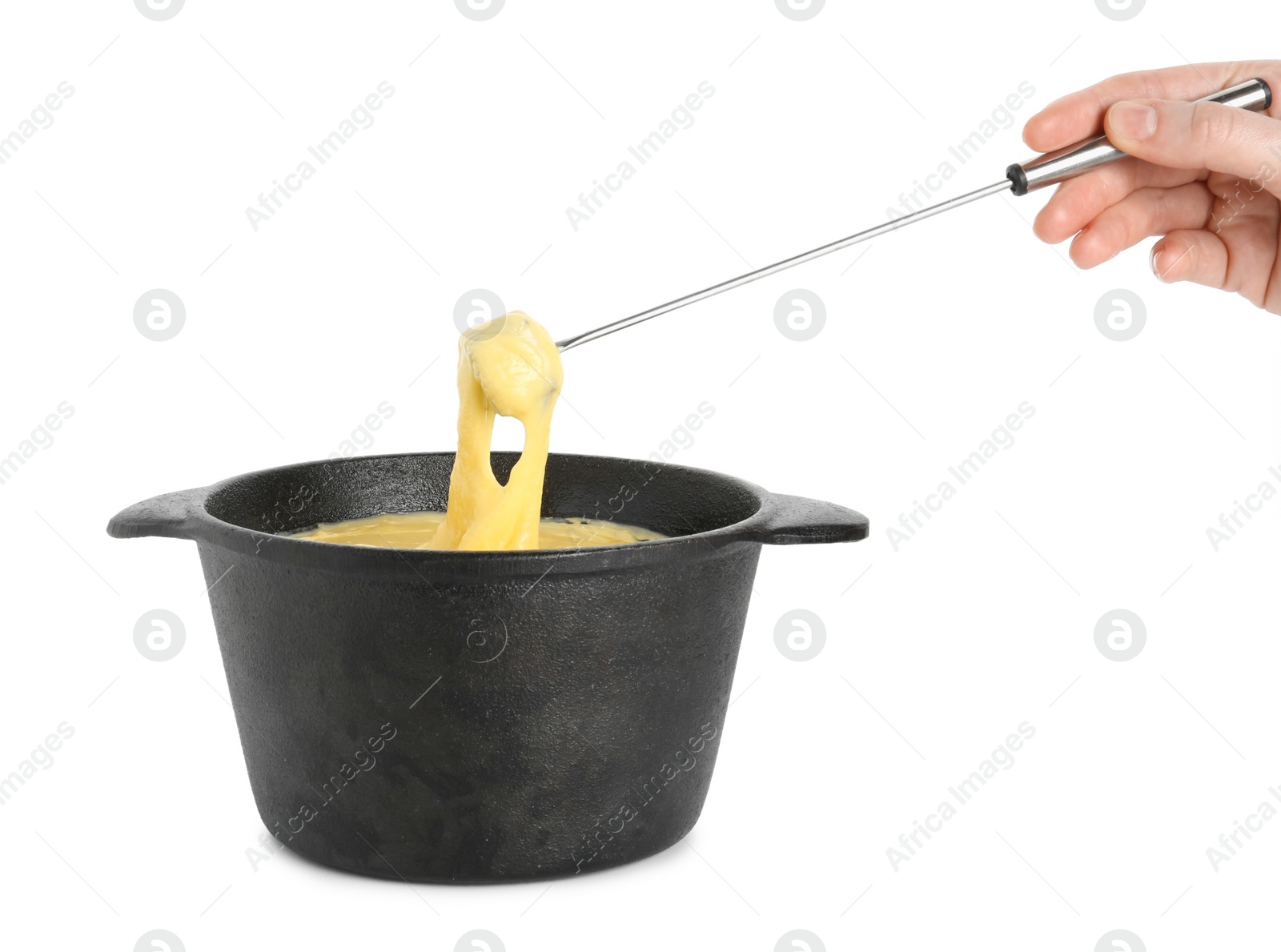 Photo of Woman dipping piece of bread into fondue pot with tasty melted cheese on white background, closeup