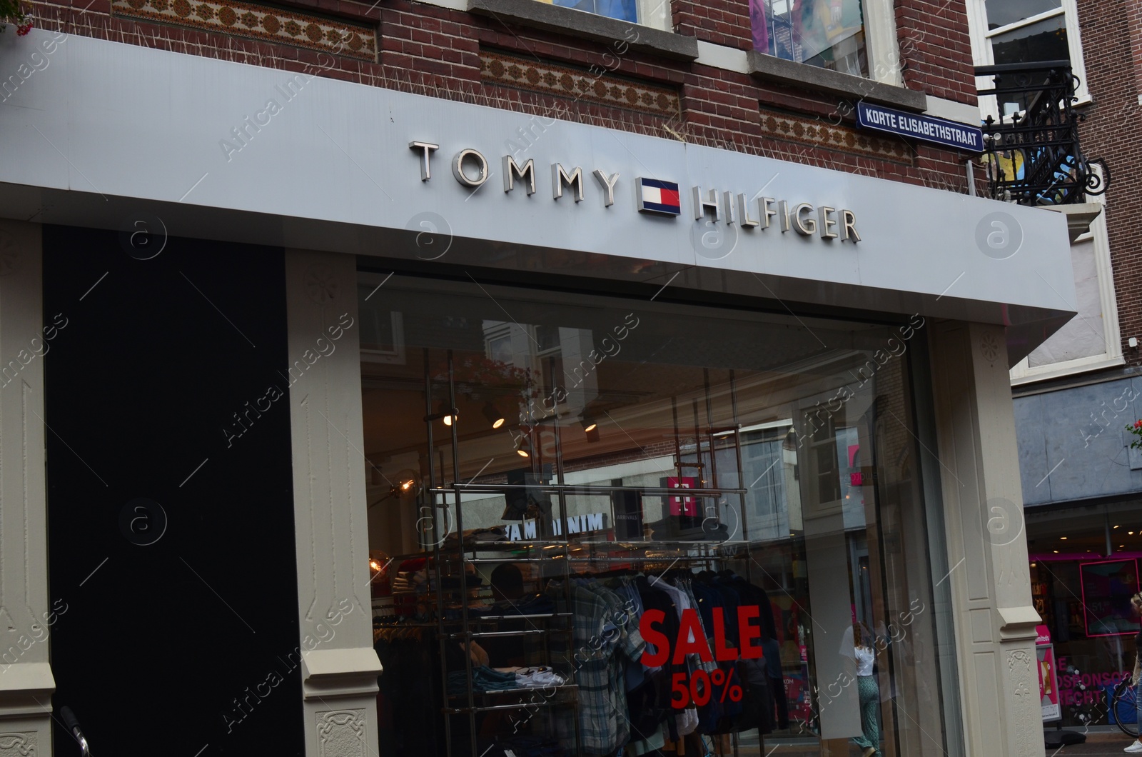 Photo of Utrecht, Netherlands July 02, 2022: Facade of Tommy Hilfiger fashion store outdoors