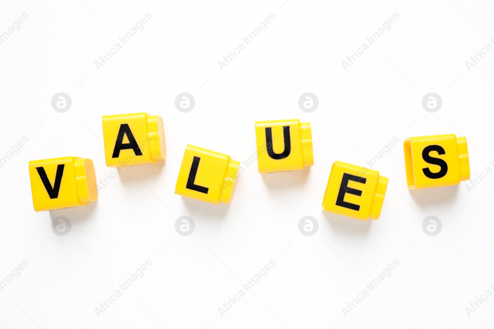 Photo of Blocks with word VALUES on white background, top view