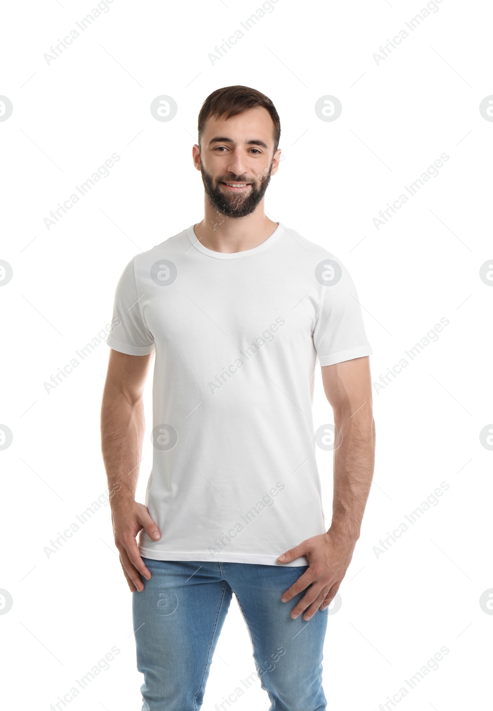 Photo of Young man in t-shirt on white background. Mockup for design