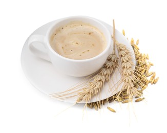 Photo of Cup of barley coffee, grains and spikes isolated on white