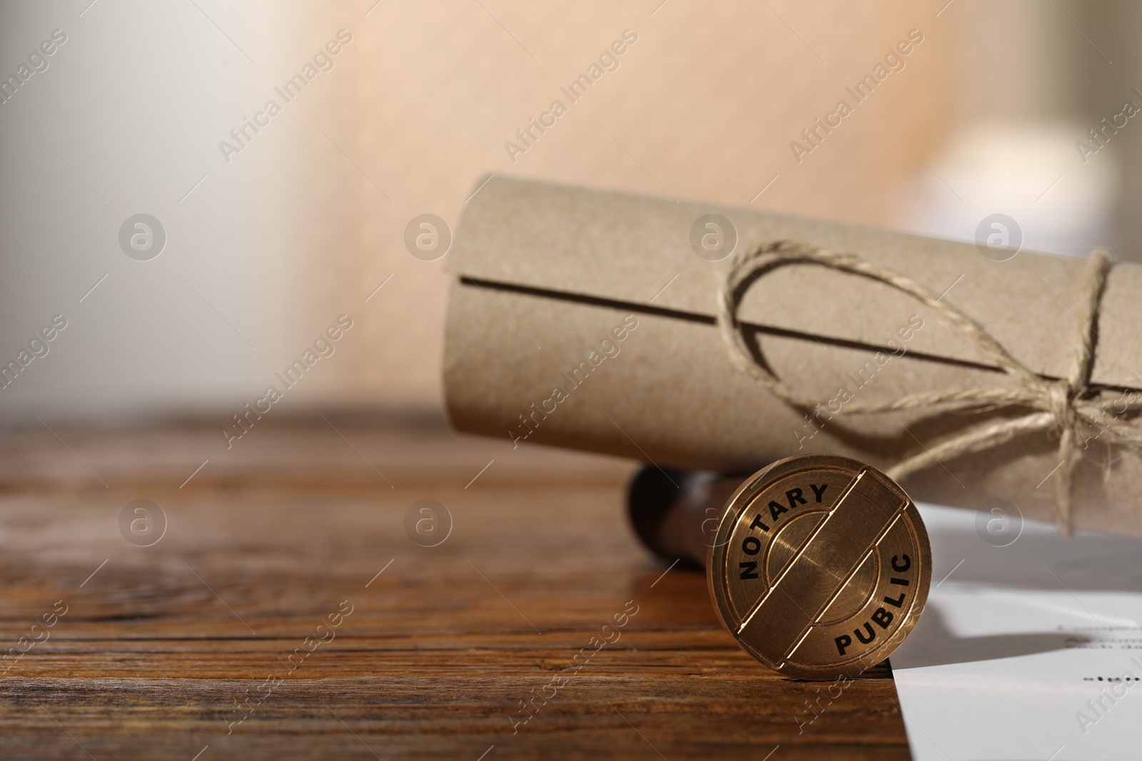 Image of Public notary. Documents and stamp on wooden table, closeup. Space for text