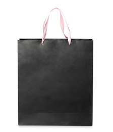 Photo of Paper shopping bag isolated on white. Mock up for design