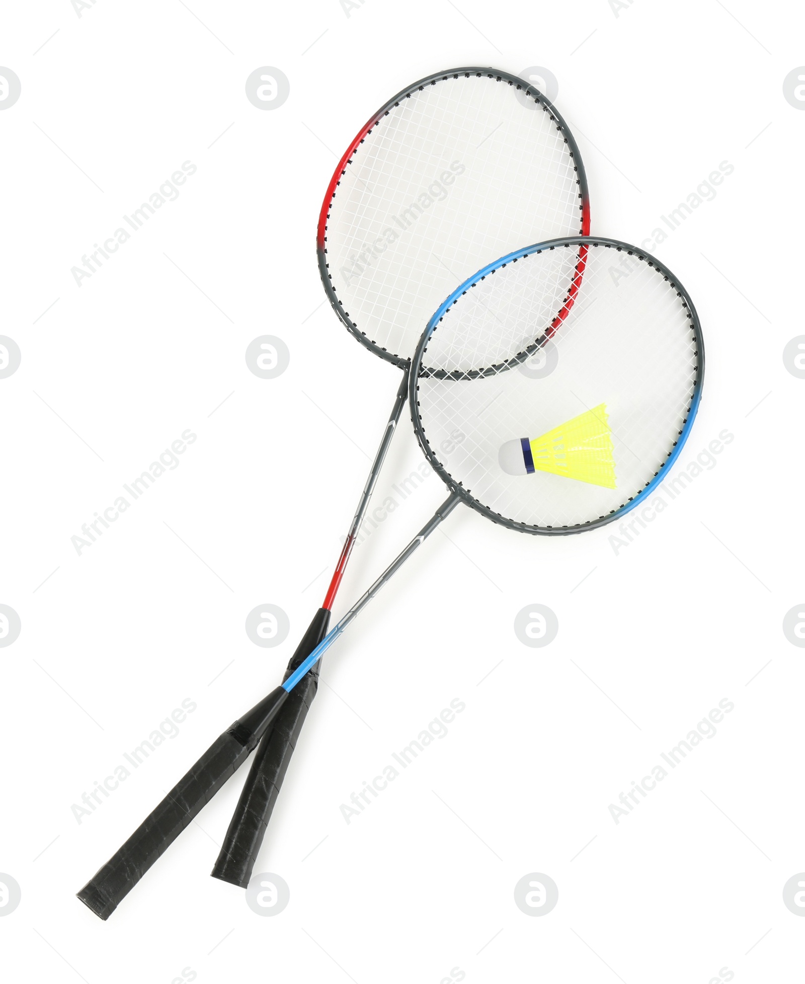 Photo of Rackets and shuttlecock on white background, top view. Badminton equipment