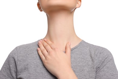 Woman with sore throat on white background, closeup
