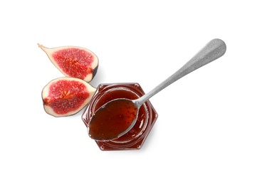 Photo of Glass jar with tasty sweet jam, spoon and halves of fresh fig isolated on white, top view