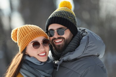 Photo of Beautiful happy couple outdoors on winter day