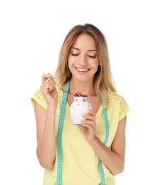 Photo of Happy slim woman with measuring tape and yogurt on white background. Positive weight loss diet results