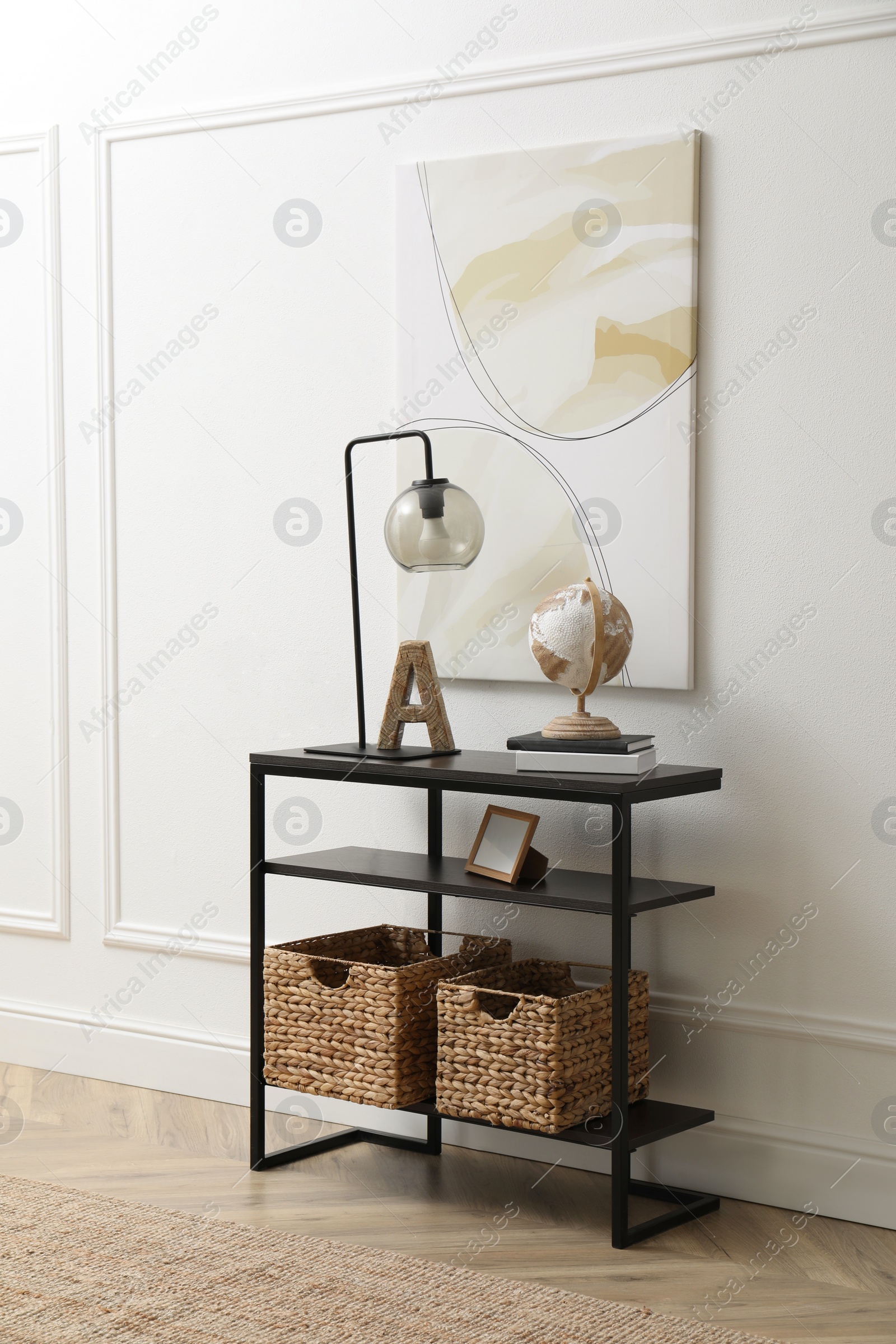 Photo of Light hallway interior with stylish console table