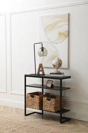 Photo of Light hallway interior with stylish console table