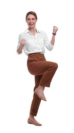 Beautiful excited businesswoman posing on white background