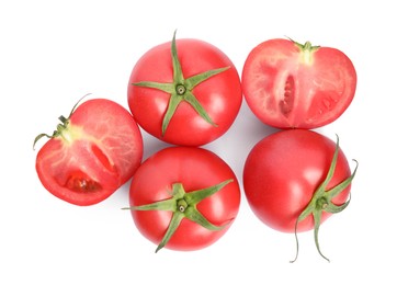 Photo of Whole and cut red tomatoes on white background, top view