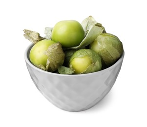 Photo of Bowl of fresh green tomatillos with husk isolated on white