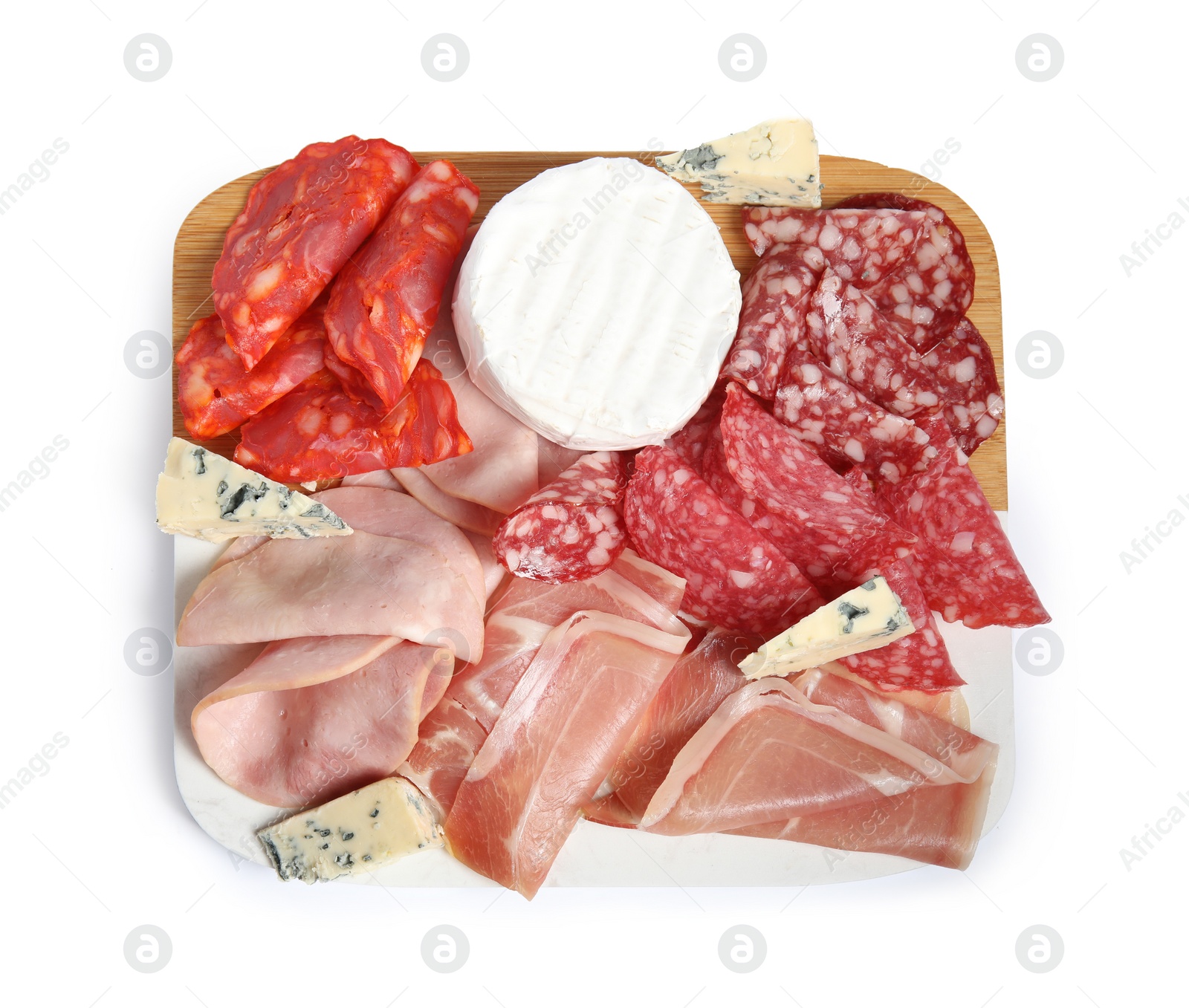 Photo of Wooden board with tasty ham and other delicacies isolated on white, top view