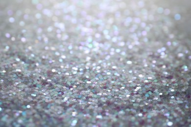 Photo of Shiny white glitter as background. Bokeh effect