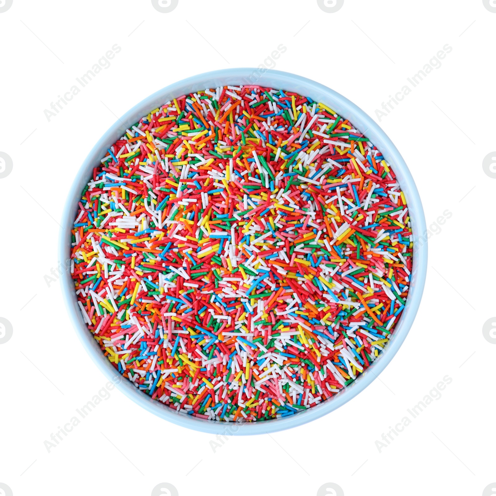 Photo of Colorful sprinkles in bowl on white background, top view. Confectionery decor