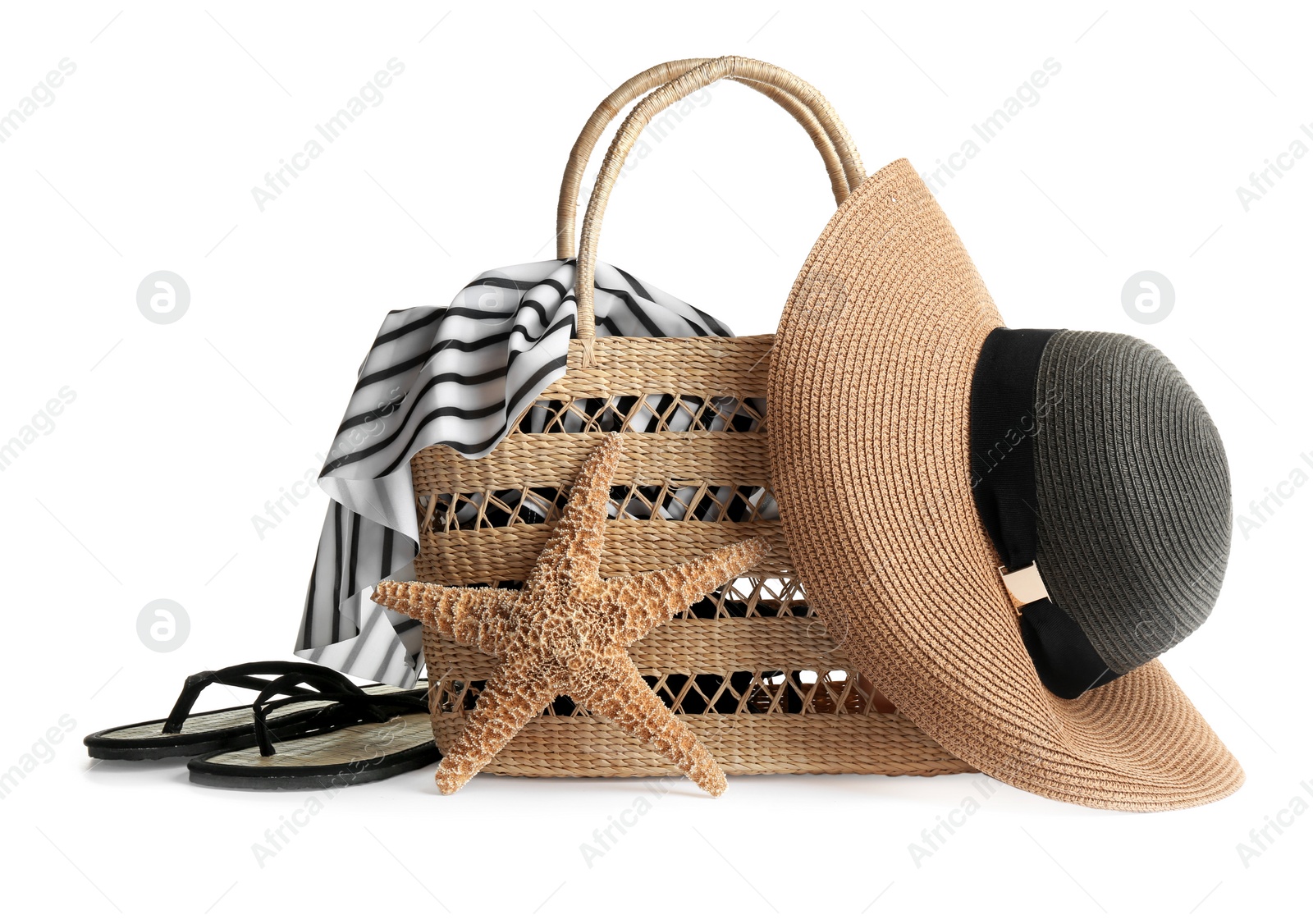 Photo of Set of beach accessories on white background