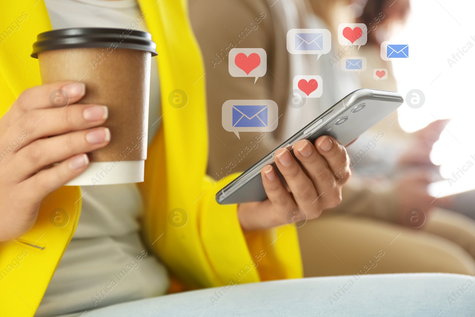 Image of Young woman with cup of coffee using smartphone, closeup. Social media