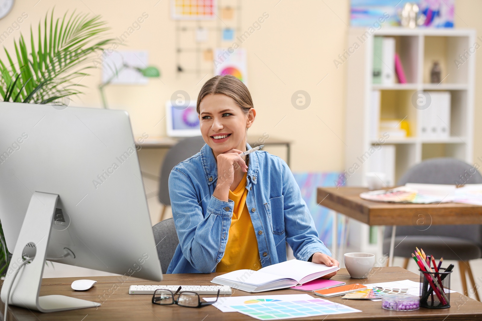 Photo of Professional interior designer at workplace in office