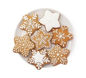 Photo of Tasty star shaped Christmas cookies with icing isolated on white, top view