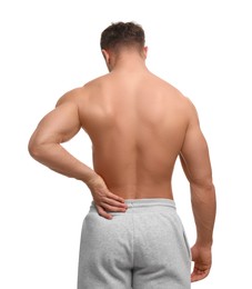 Photo of Man suffering from back pain on white background, back view