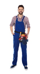 Full length portrait of construction worker with tool belt on white background